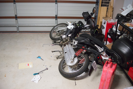 Placing the bike on its side reduced the risk of spilling oil on the floor.