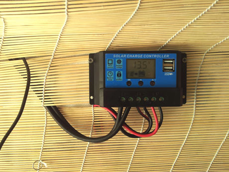 The solar charge controller, steps down the voltage from the solar panel to max 14.5 volts and is working in parallel with the dual battery controller